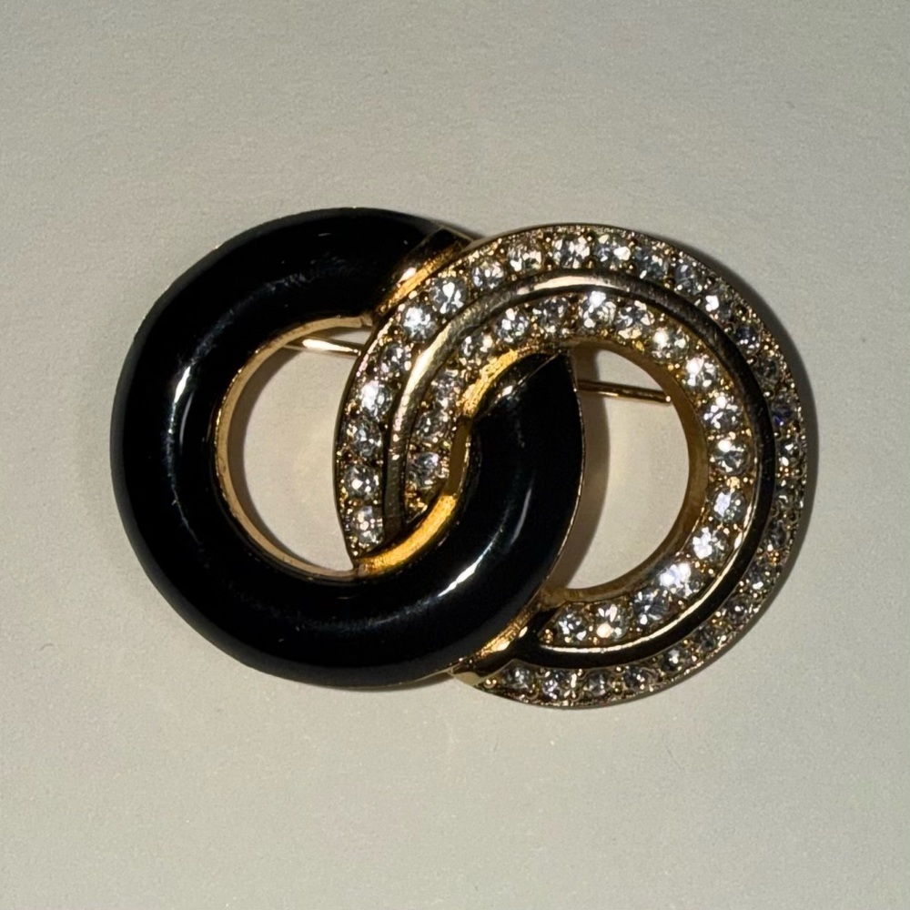 Vintage CHRISTIAN DIOR Black and Gold Interlocking Circle Brooch with Crystals